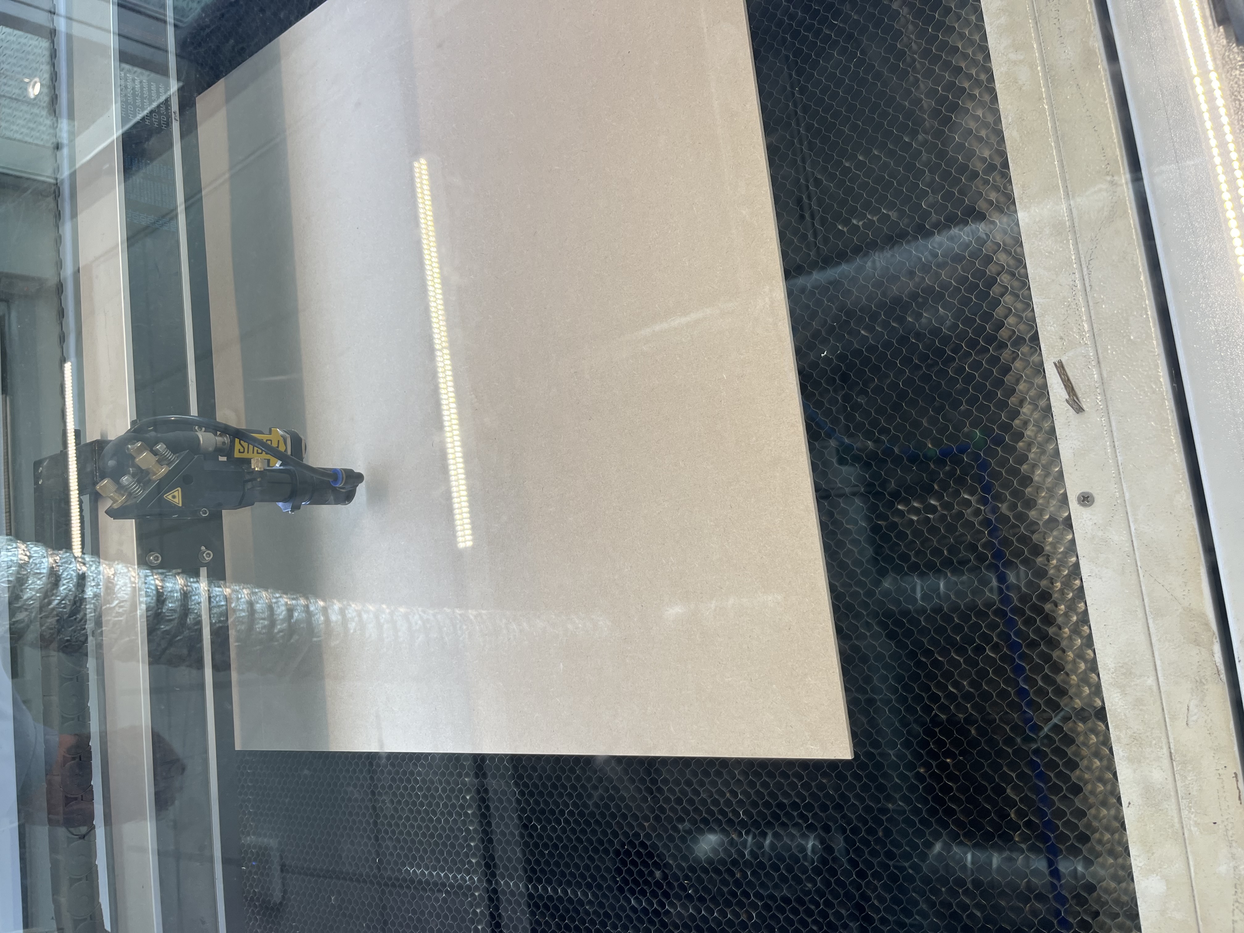 Start laser cutting of the backboard and side pieces